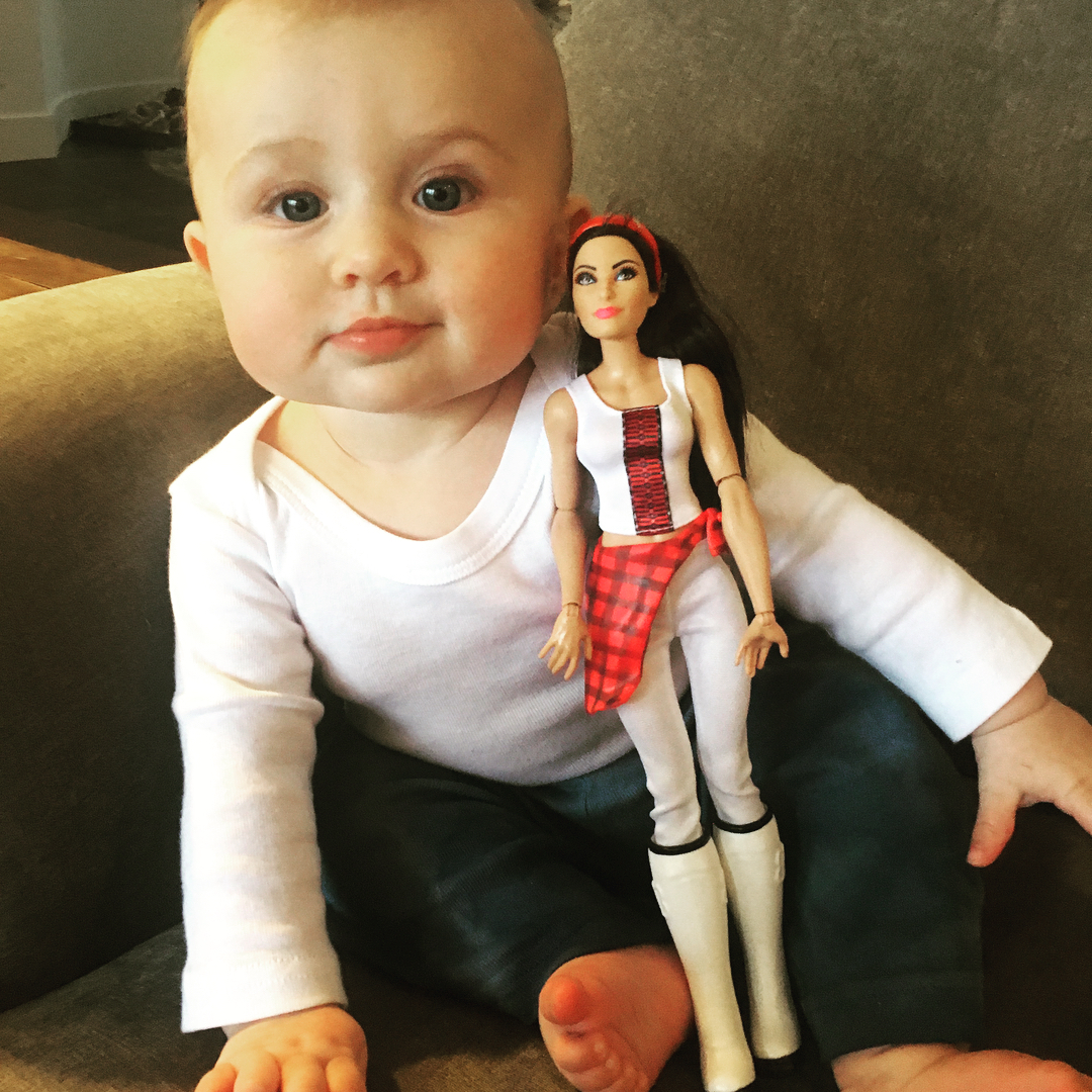 Big Brother Global Brie Bella Shares Photo Of Daughter Birdie Playing With Bella Doll 